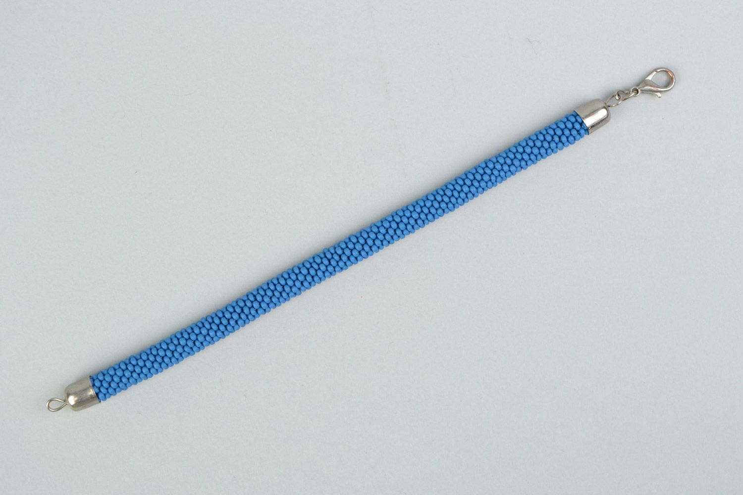 Handmade bright laconic beaded cord wrist bracelet of sky blue color for girl photo 5