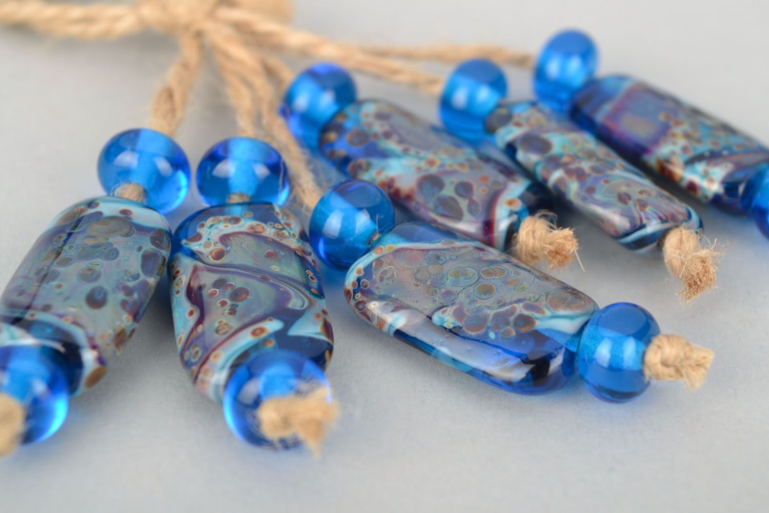 Handmade glass beads of blue color photo 3