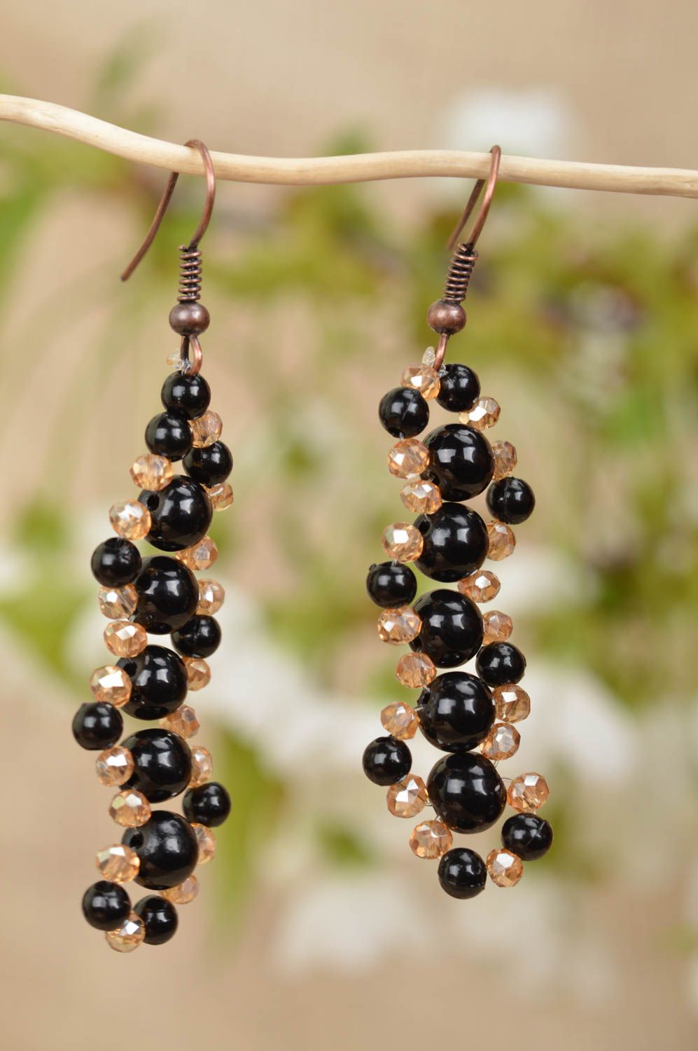 Stylish handmade earrings with rock crystal and ceramic beads black and gold photo 1