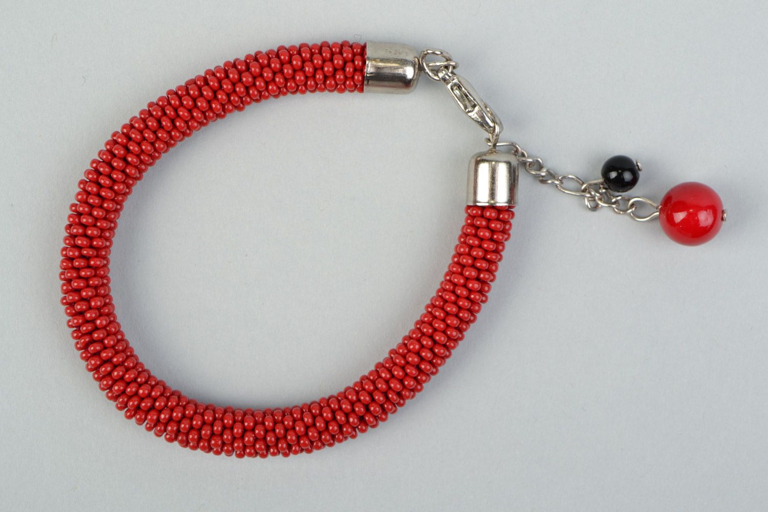 Handmade bright red beaded cord women's wrist bracelet with glass beads photo 2