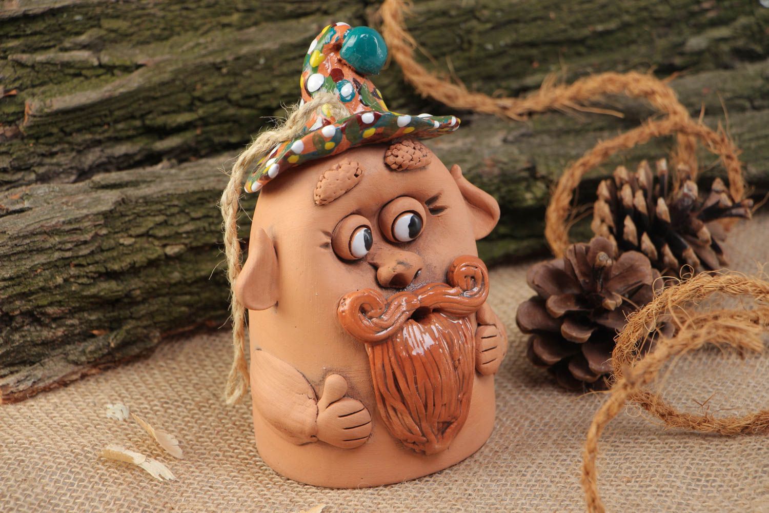 Handmade decorative ceramic bell painted with acrylics in the shape of old man photo 1