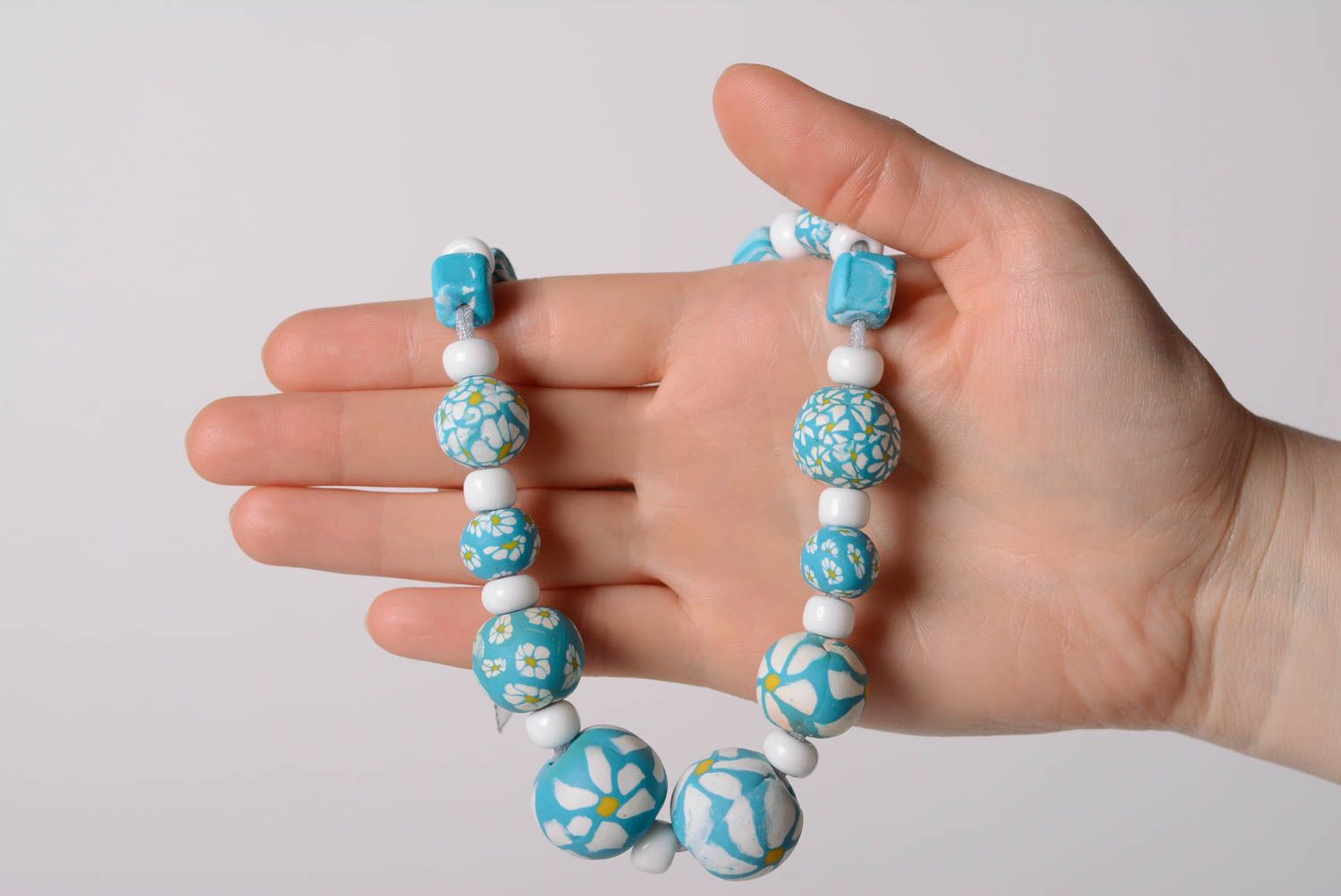 Handmade beaded necklace made of polymer clay blue with flowers on organza ribbon photo 4