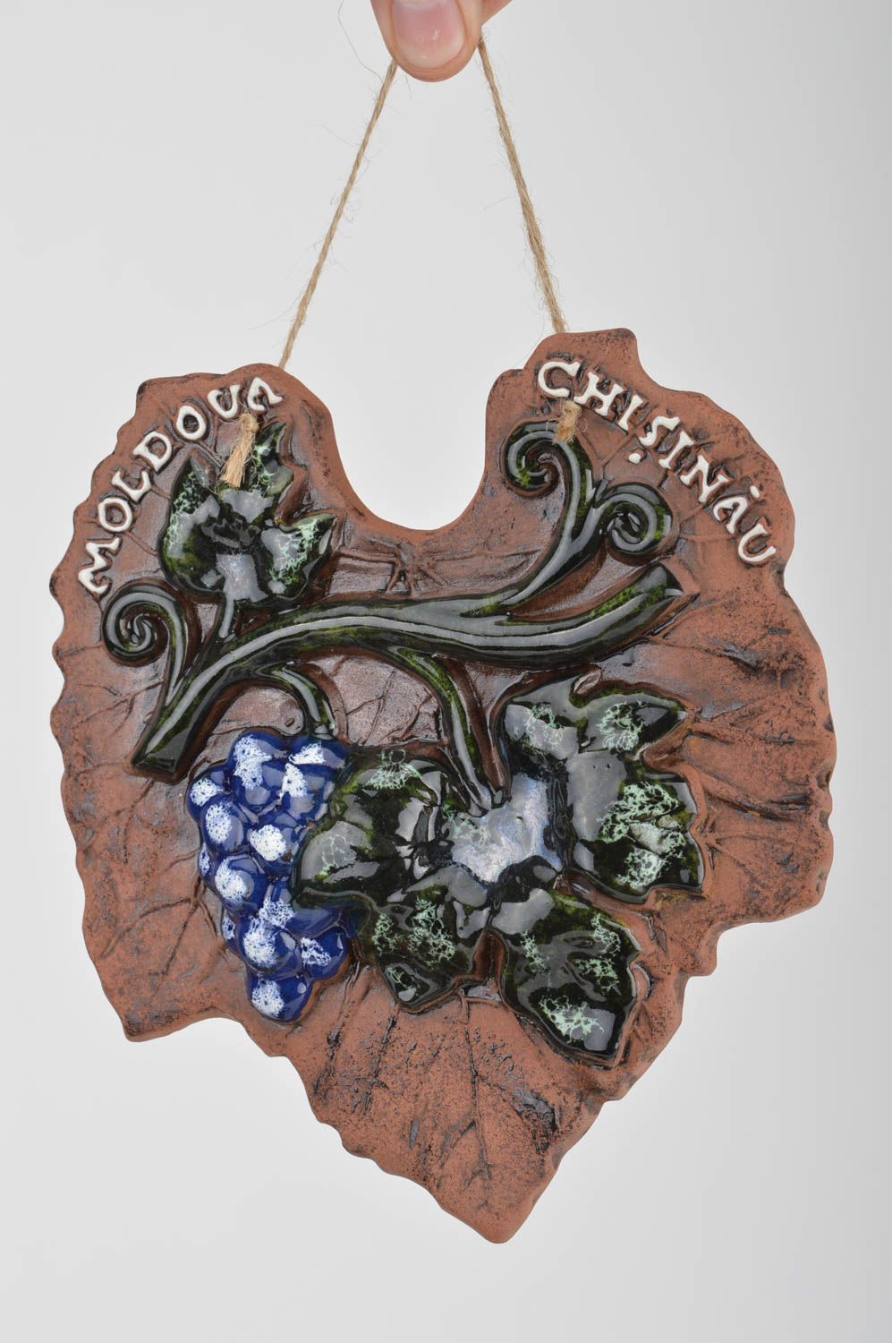 Handmade decorative ceramic wall hanging panel in the shape of vine leaf photo 3