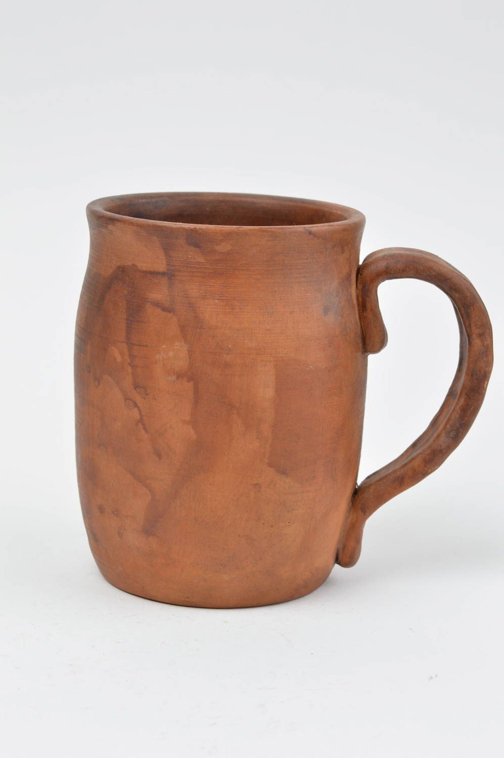 Clay beer drinking mug with handle without a pattern in light brown color photo 2