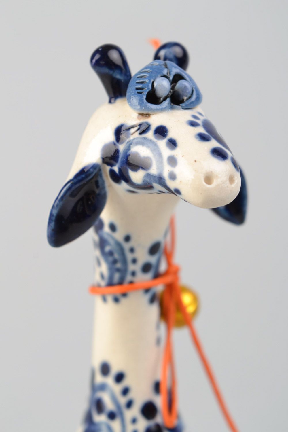 Handmade small ceramic figurine of giraffe painted with white and blue glaze photo 4