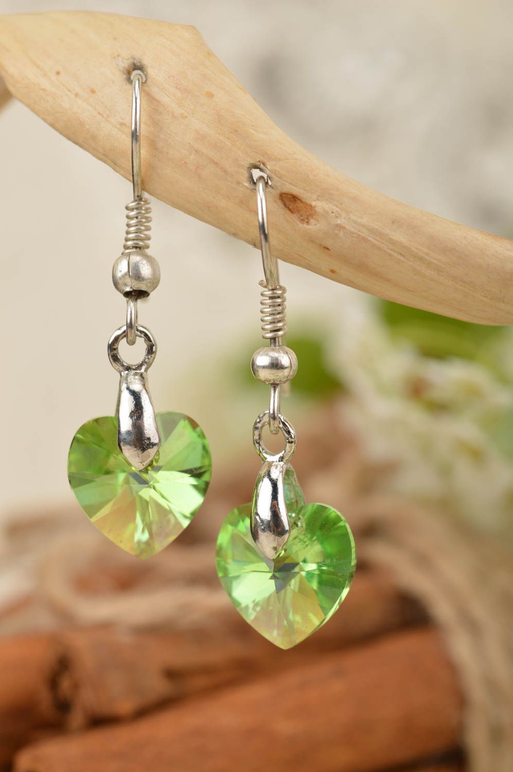 Handmade earrings with designer crystals in shape of small green hearts photo 1