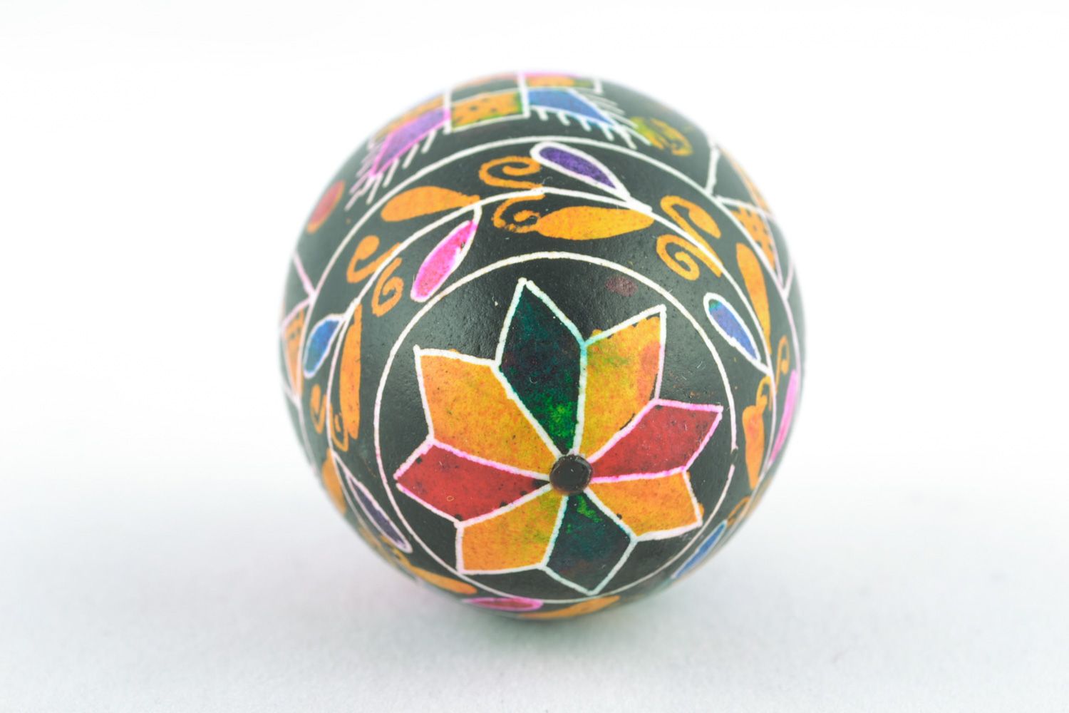 Decorative Easter egg with wax painting of black color with traditional patterns photo 5