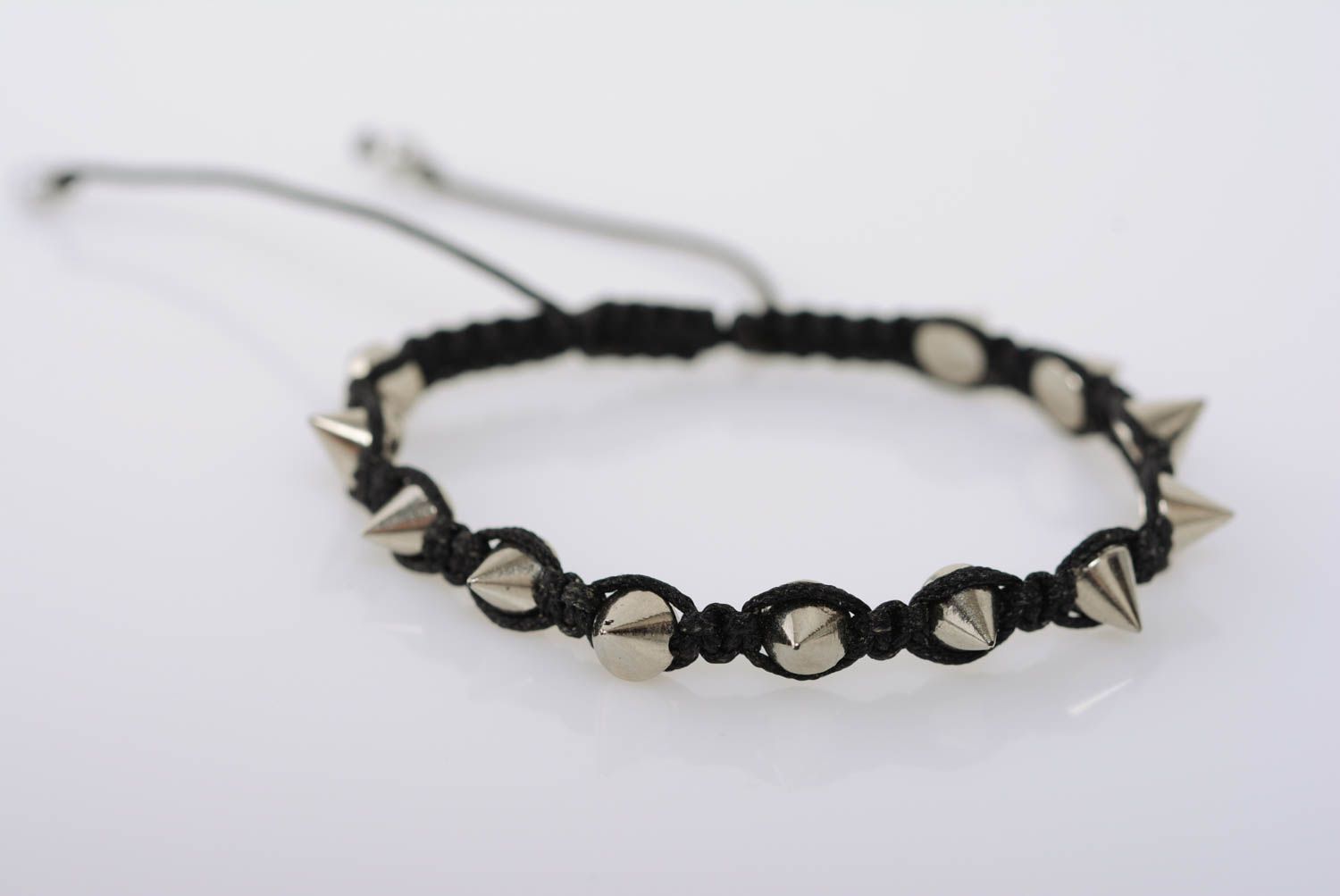 Beautiful black handmade thin macrame woven cord bracelet with metal studs photo 1