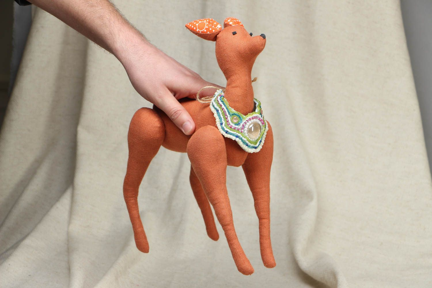 Дизайнерская игрушка из ткани в виде олененка фото 4