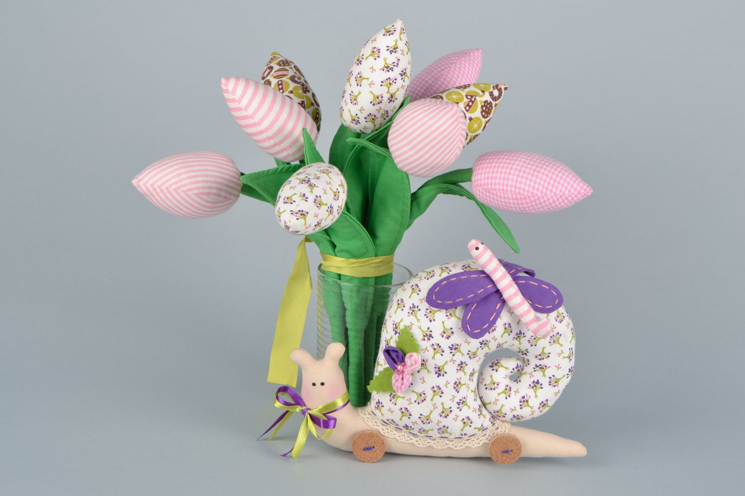 Interior decorative composition soft toy snail with tulips and decorative flowers photo 4