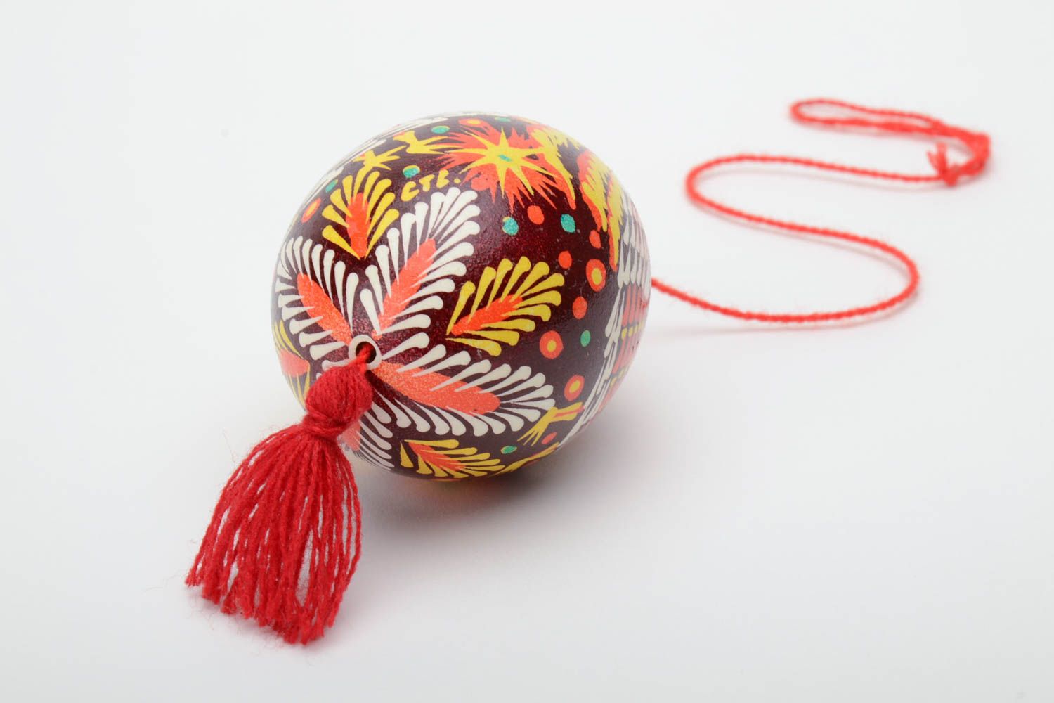 Handmade decorative painted Easter egg ornamented in Lemkiv style with red tassel photo 4