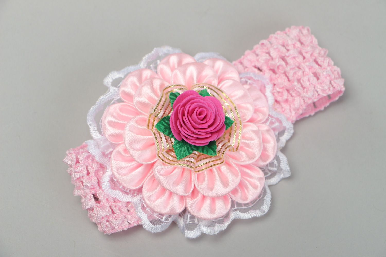 Stylish handmade babies headband with satin ribbons and lace in pink color palette photo 2