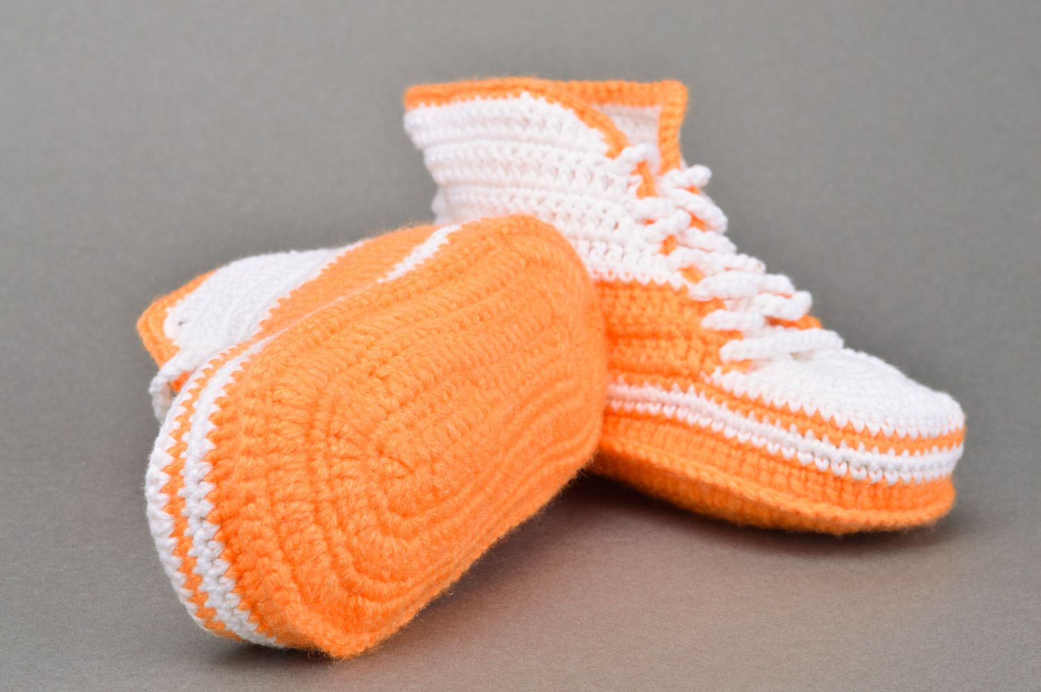 Handmade crocheted small orange and white baby shoes with shoelaces photo 5