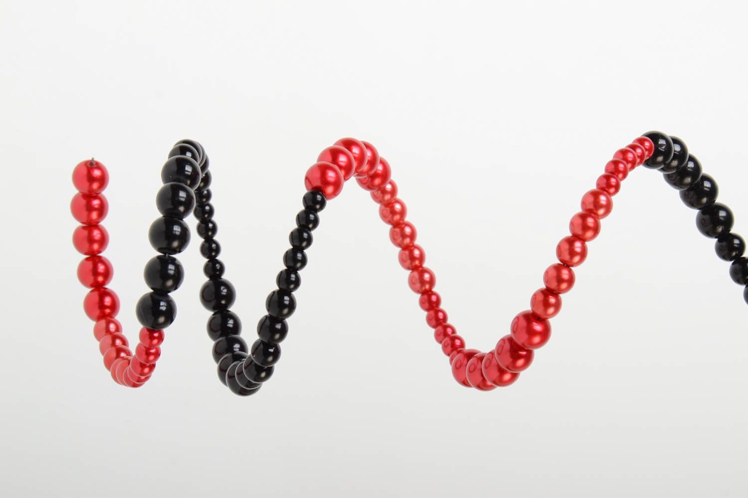 Red and black handmade designer wrist bracelet woven of plastic beads photo 3