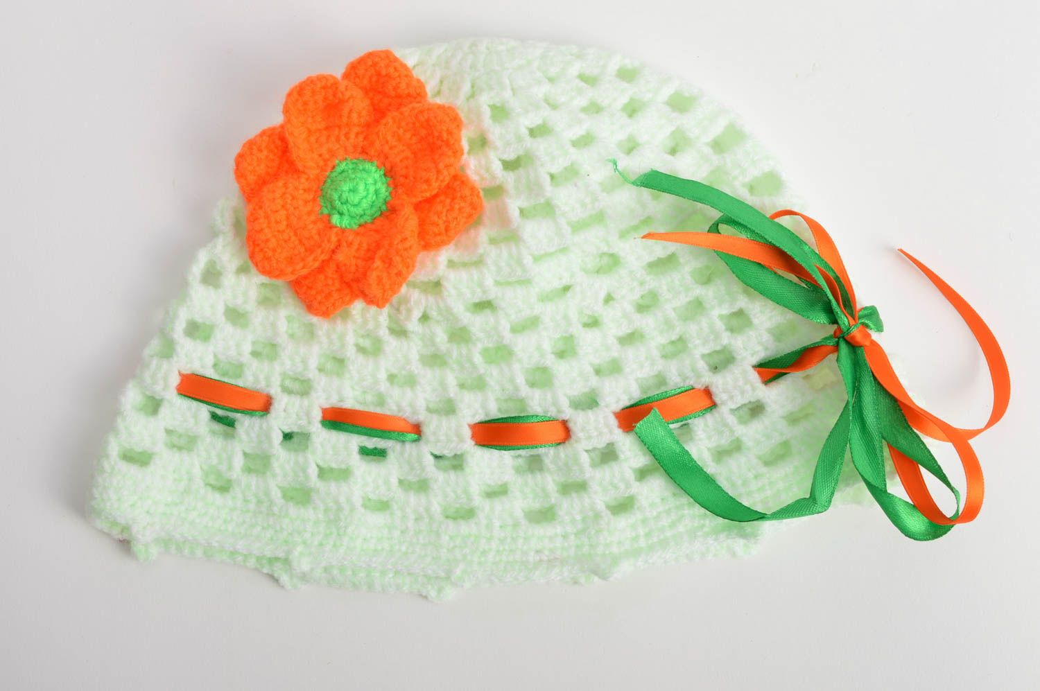 Handmade hat for girls crocheted of lime threads decorated with knitted flower photo 2