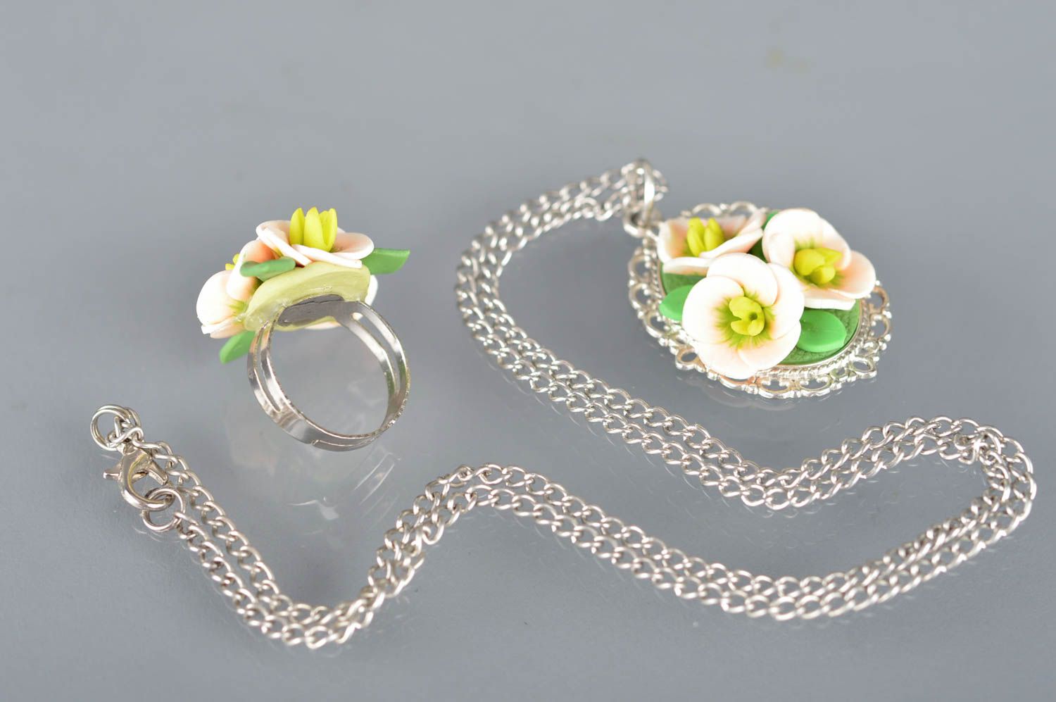 Set of polymer clay handmade jewelry pendant and a ring with beautiful flowers photo 5