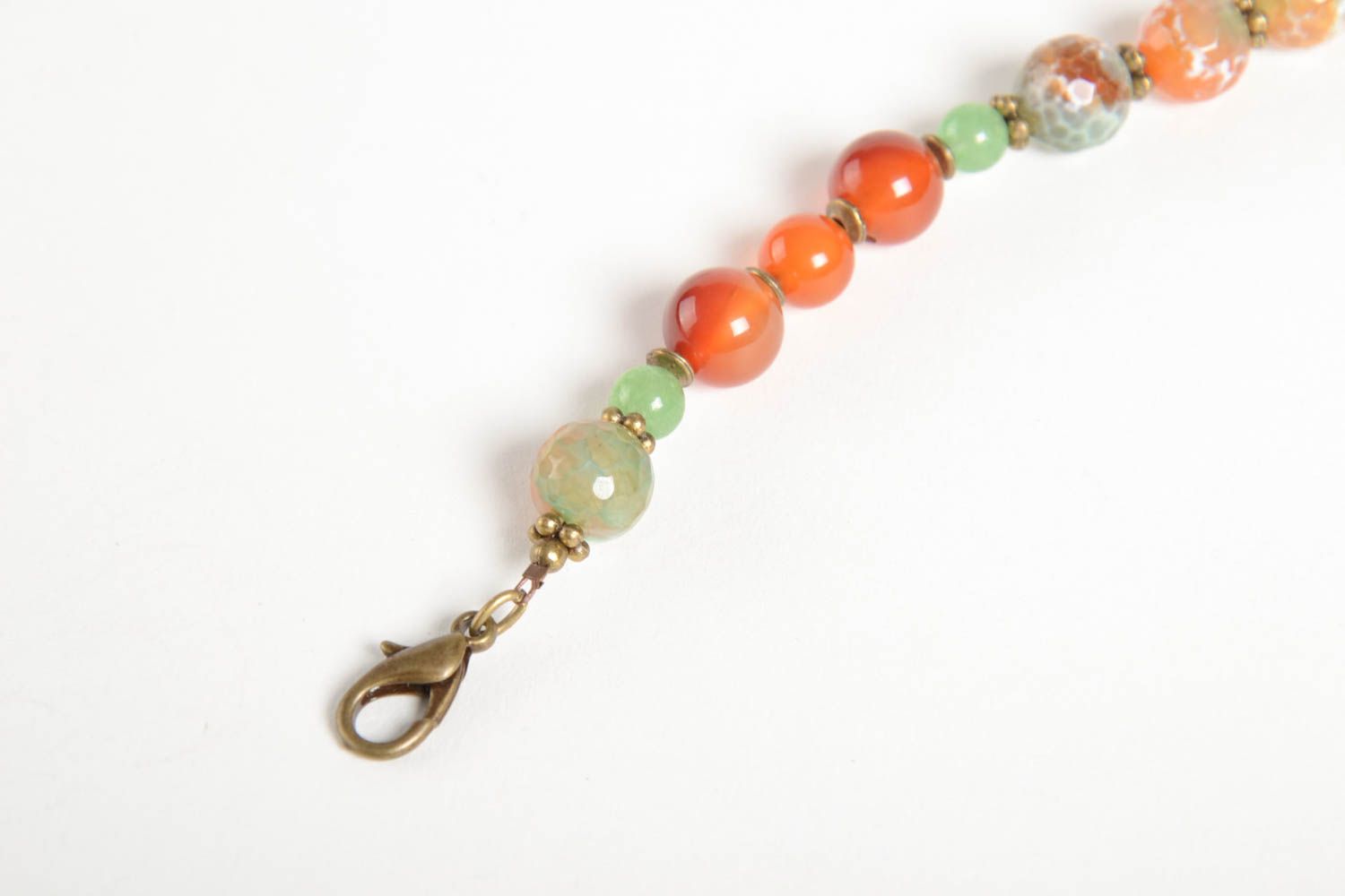 Stylish handmade gemstone beaded adjustable bracelet in pale green and orange color photo 4