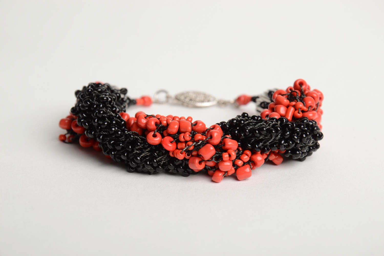 Handmade volume woven wrist bracelet crocheted of red and black Czech beads photo 3