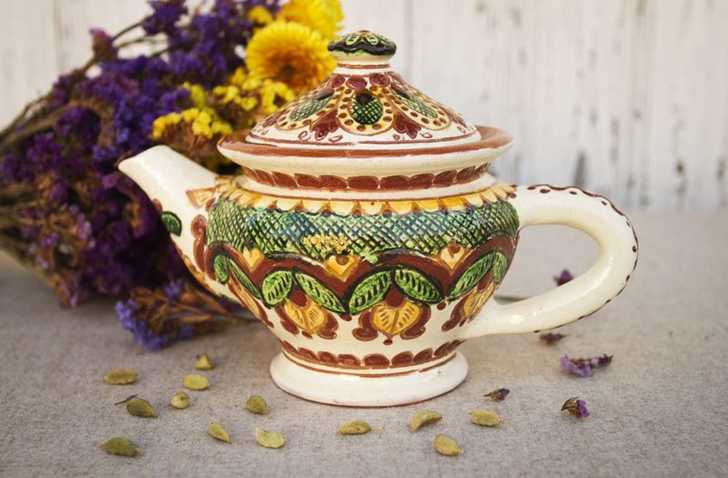 Decorative clay teapot photo 1