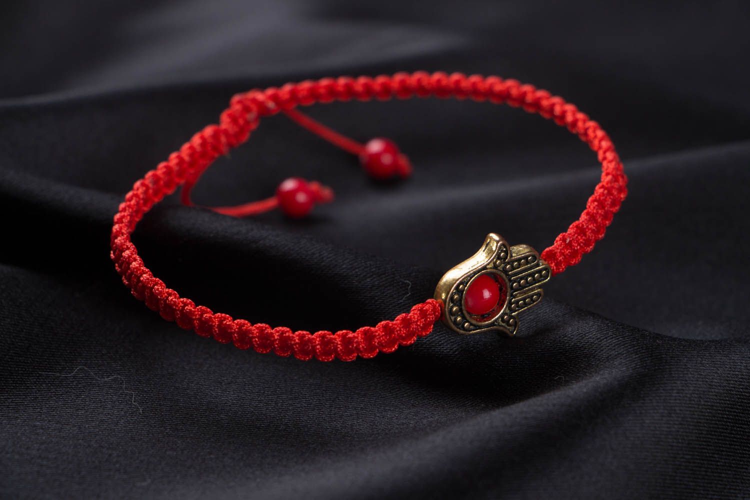 Woven bracelet with hamsa photo 2