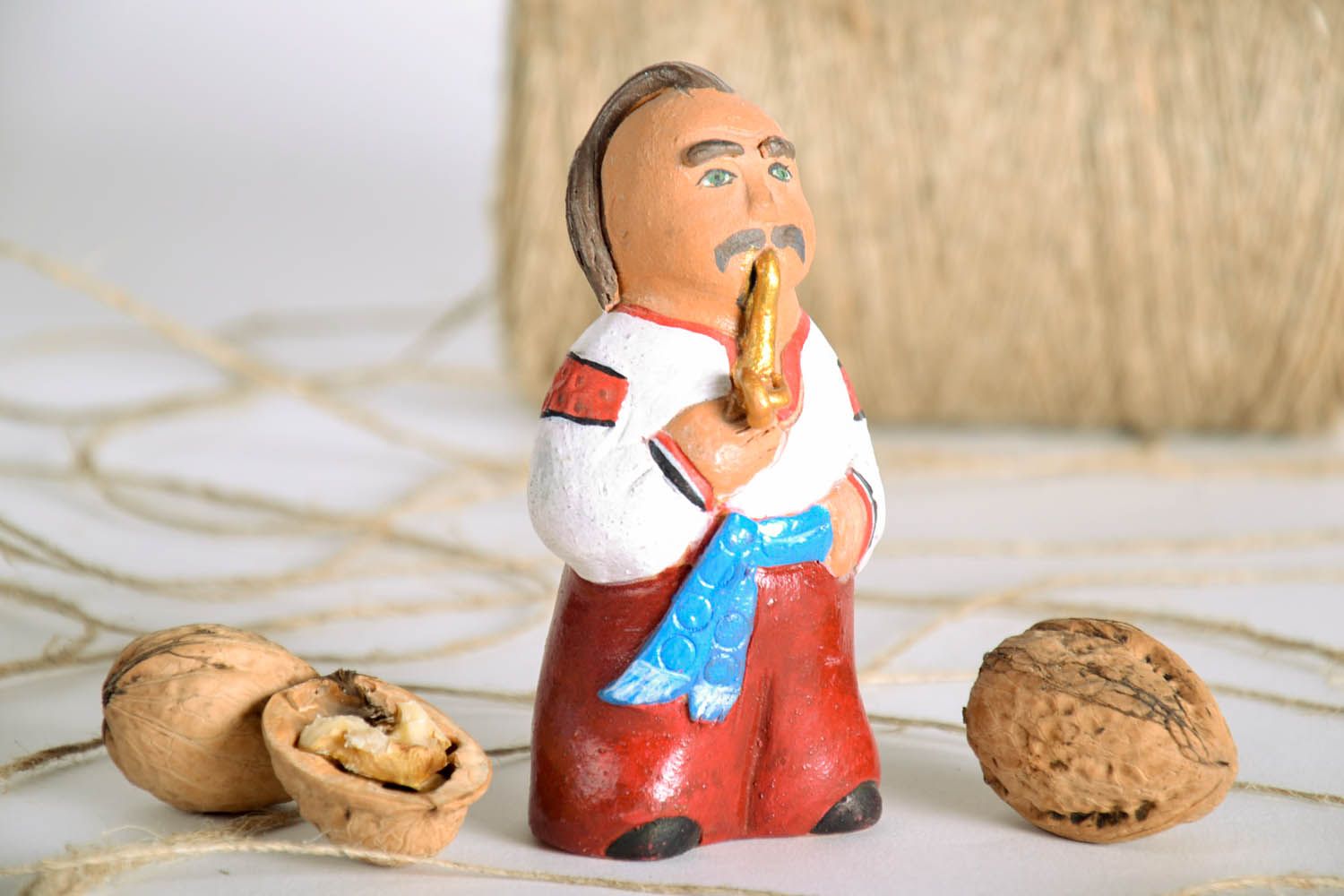 Decorative ceramic figurine in the shape of Cossack  photo 1