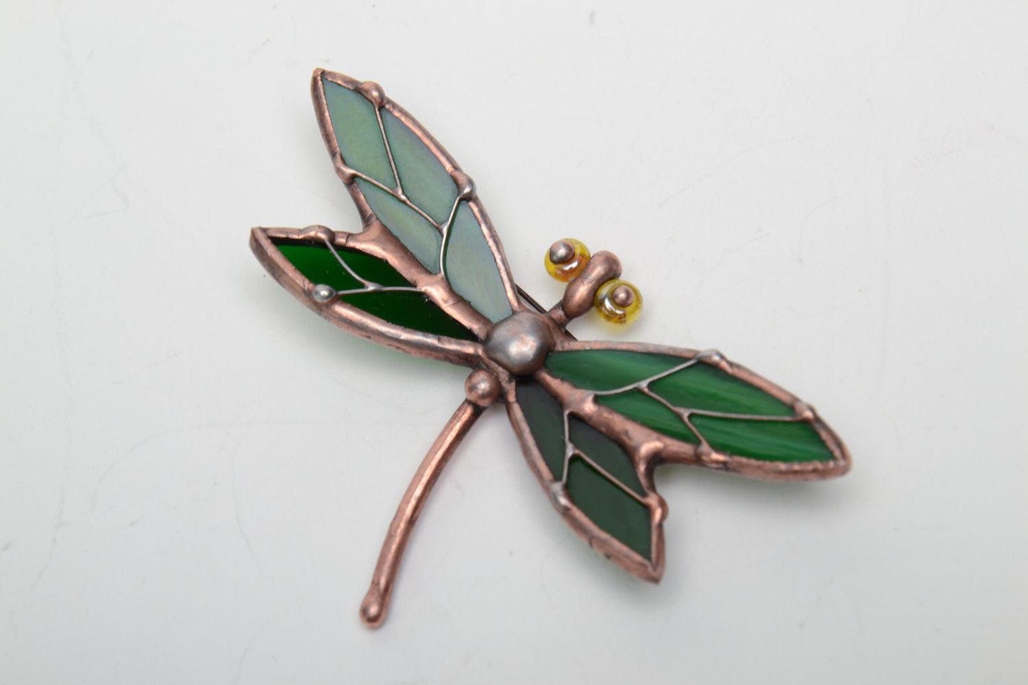Stained glass brooch in the shape of dark green dragonfly photo 2