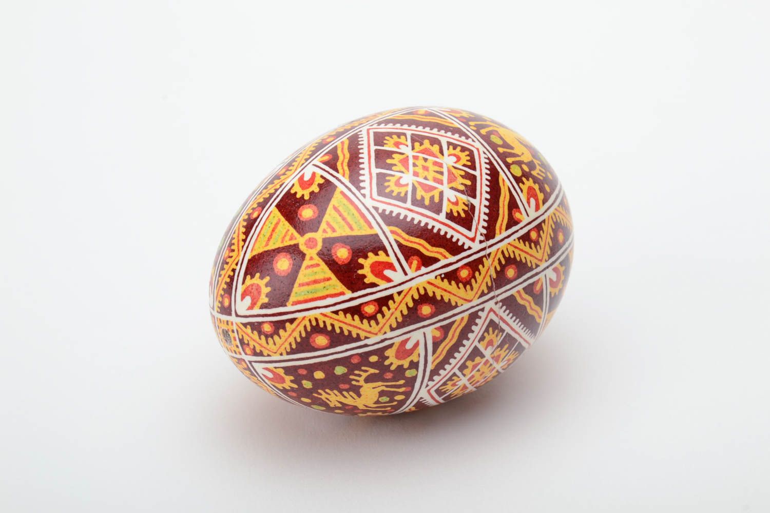 Handmade decorative painted egg pysanka with ornaments ethnic souvenir for Easter photo 2