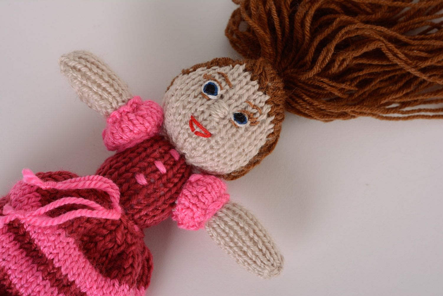 Nice homemade soft knitted doll in dress for children photo 3