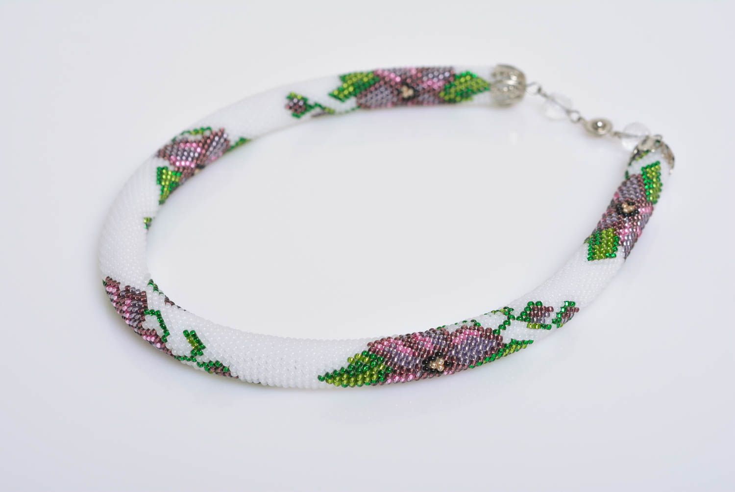 Beautiful handmade design woven beaded cord necklace white with floral ornament photo 4