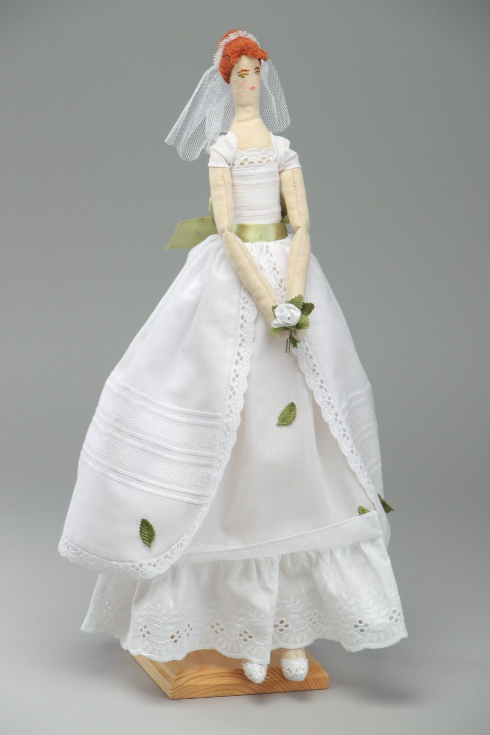 Beautiful handmade decorative fabric doll in wedding dress photo 1