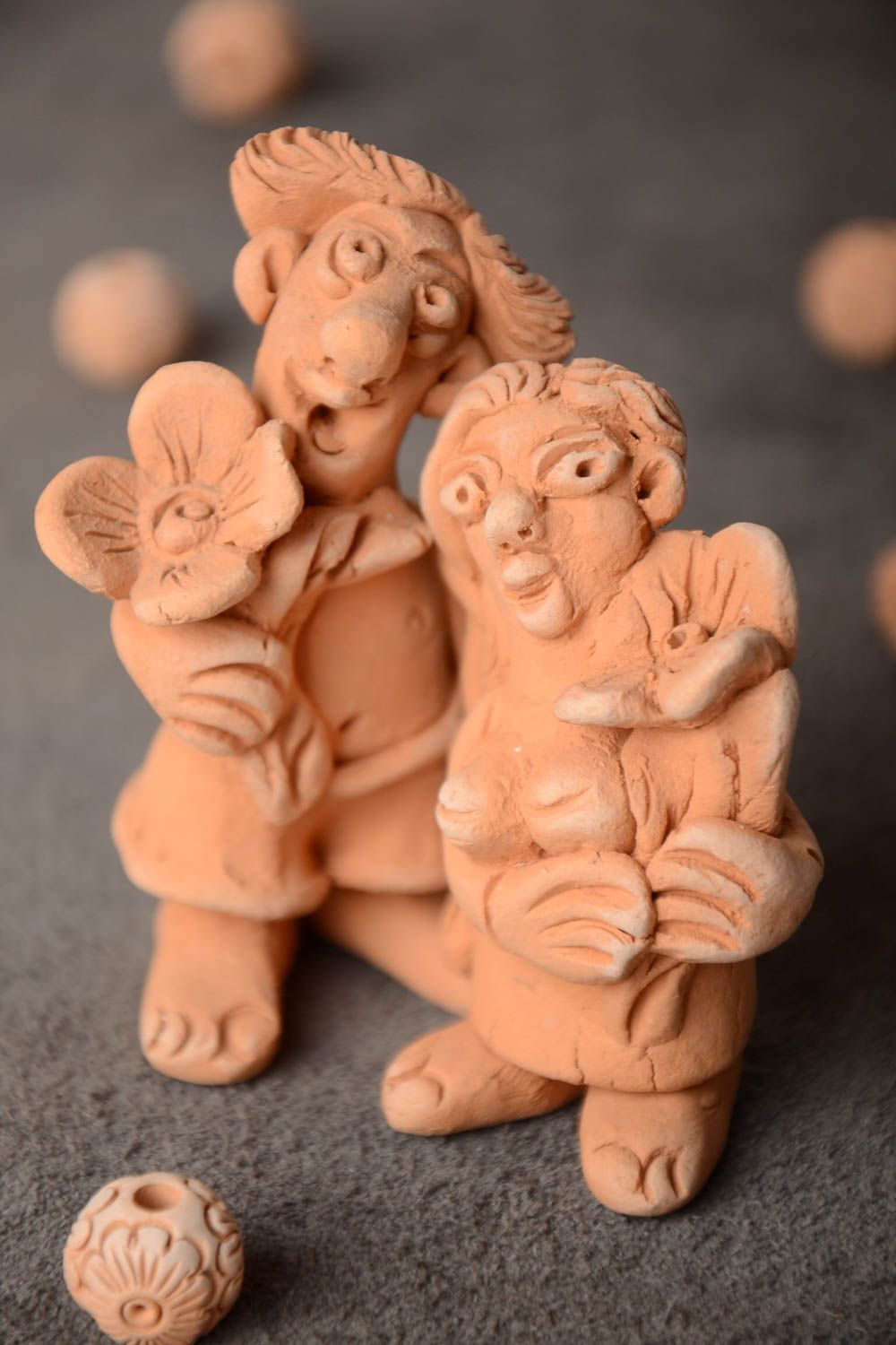 Set of 2 handmade decorative ceramic figurines of man and woman with flowers photo 1