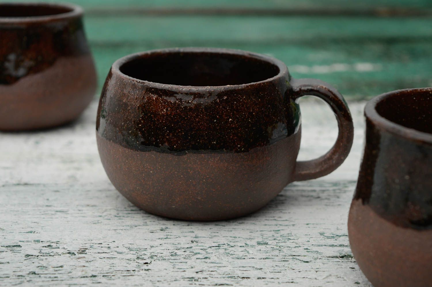 Clay coffee cup in chocolate color, glazed inside with handle and pot shape photo 1