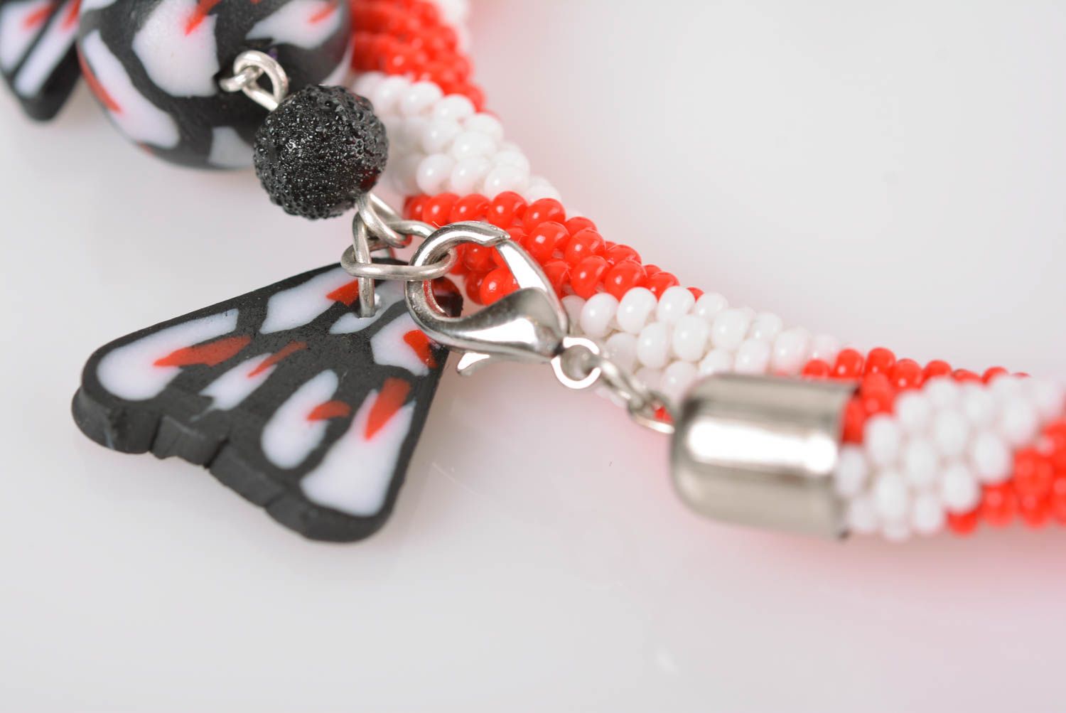 Handmade white and orange beaded cord wrist bracelet with polymer clay charm photo 3