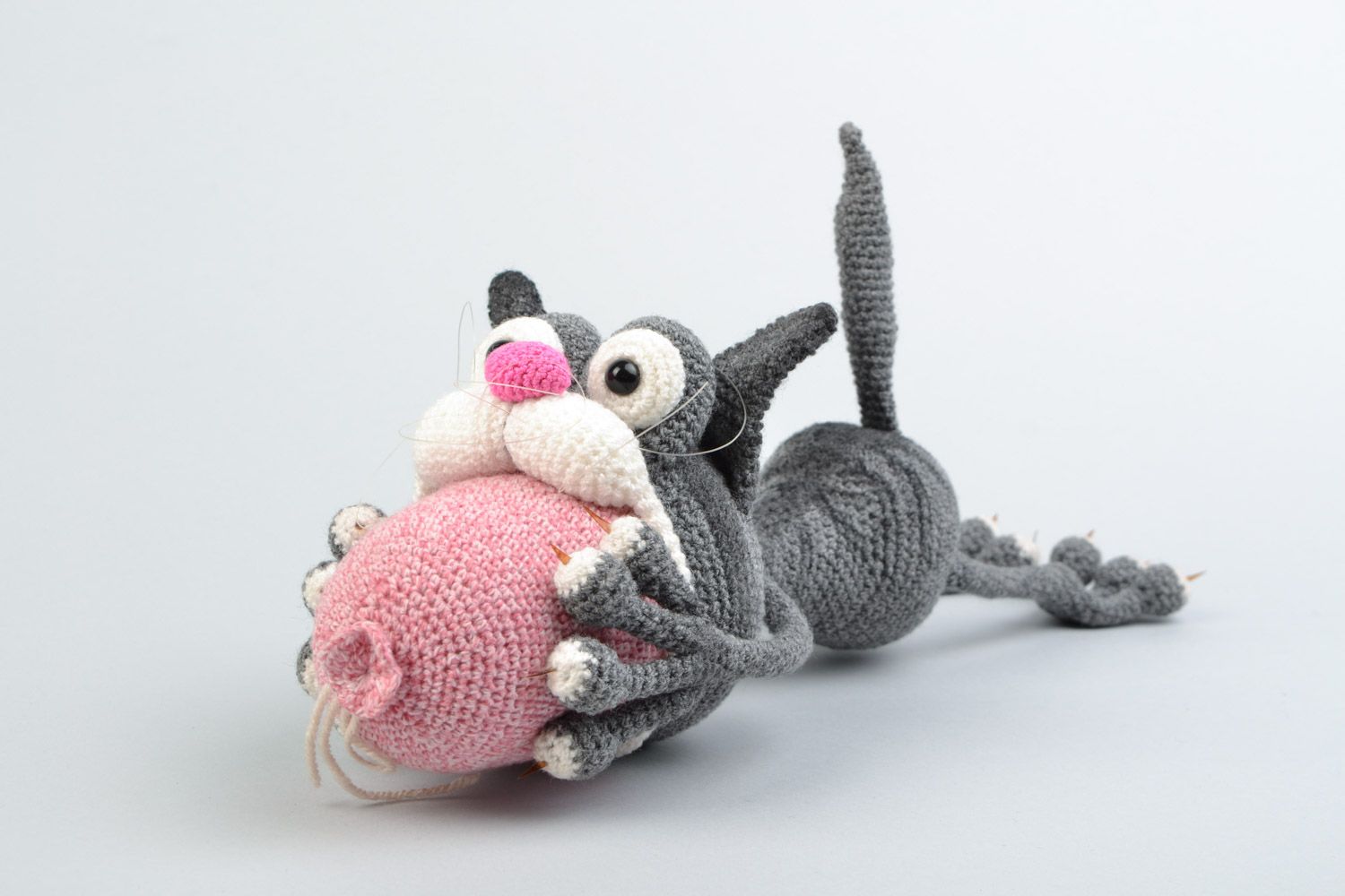 Handmade crocheted soft toy funny grey cat with sausage for children photo 1
