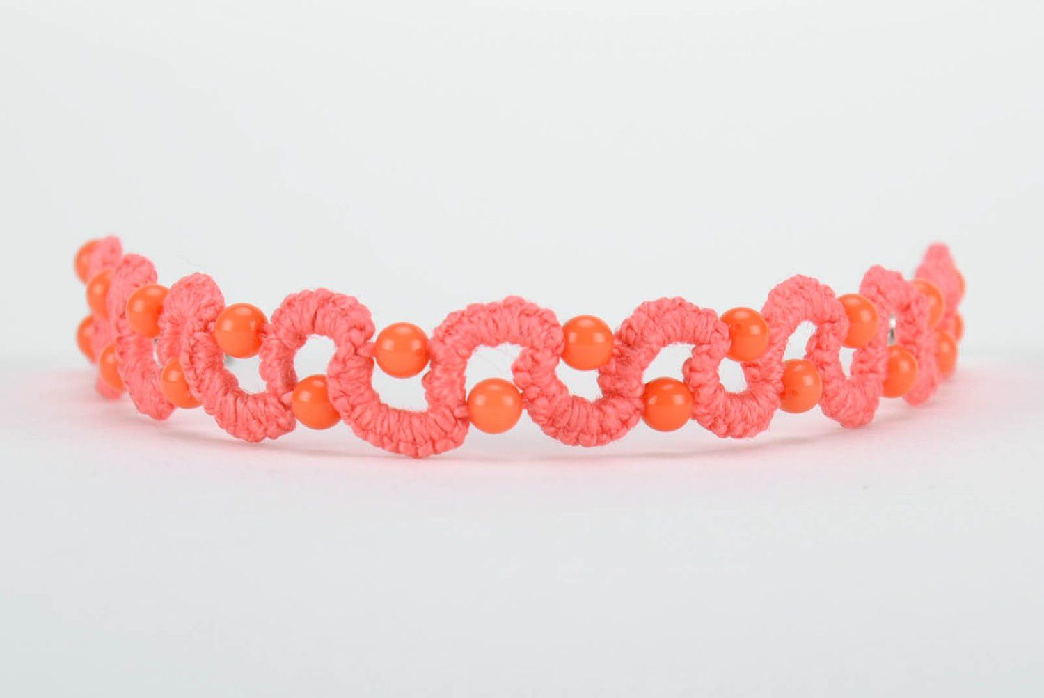 Bracelet fait main orange tressé de fil en coton photo 3