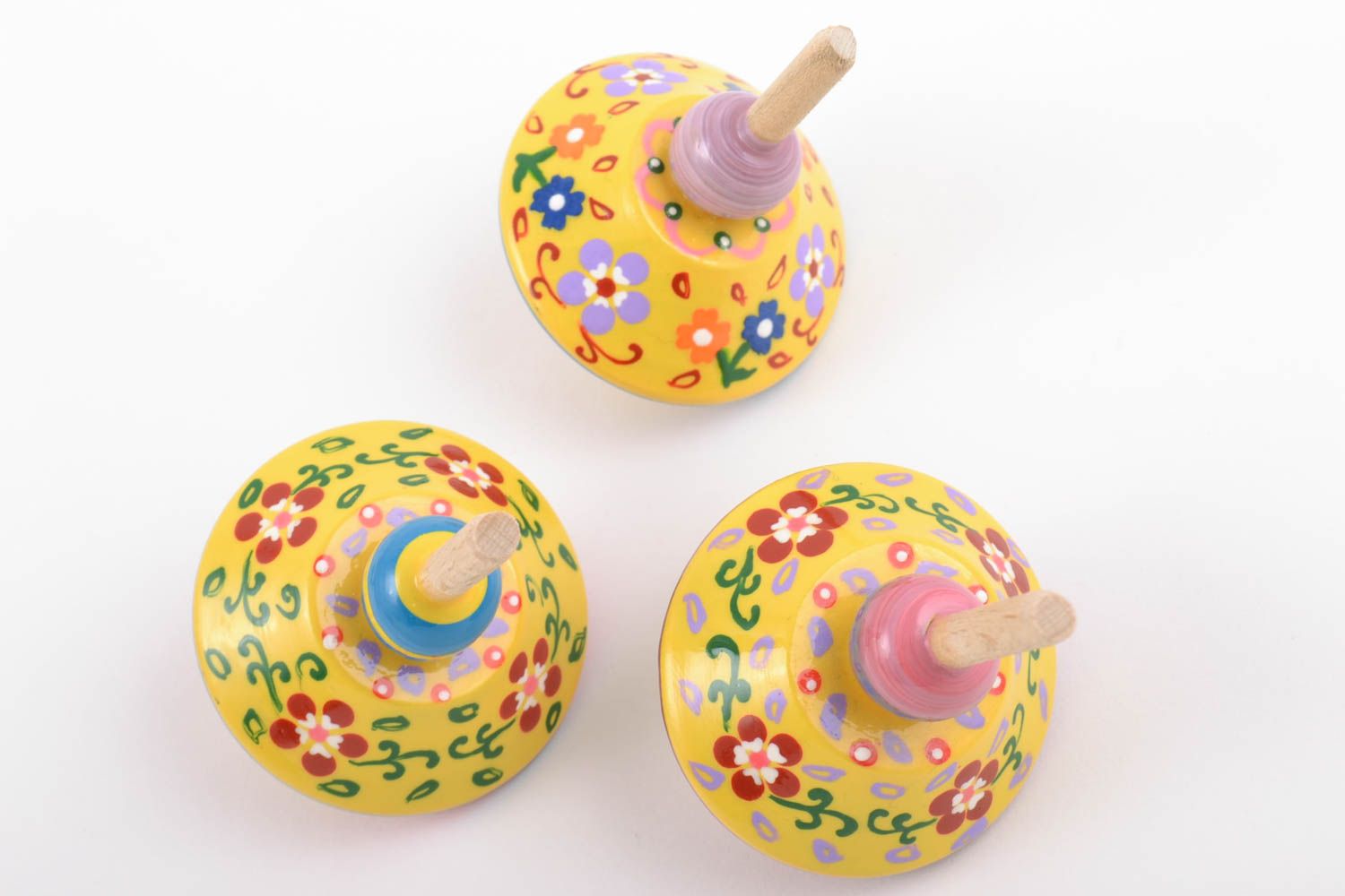 Set of handmade yellow painted wooden toys eco spinning tops 3 pieces photo 3
