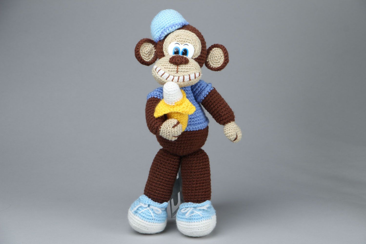 Muñeco de peluche artesanal Mono con plátano foto 1