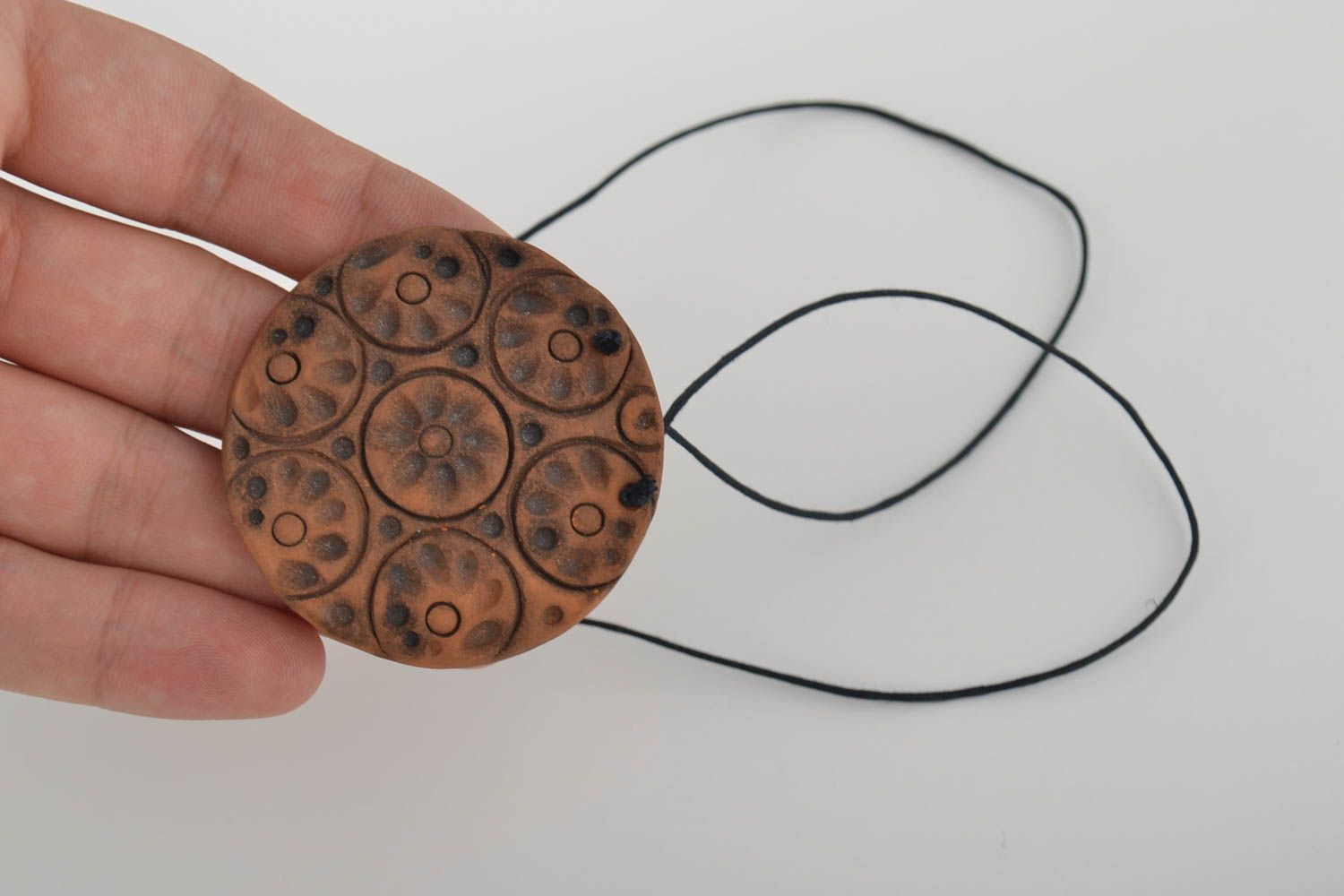 Clay beautiful ethnic handmade pendant of round shape  photo 2