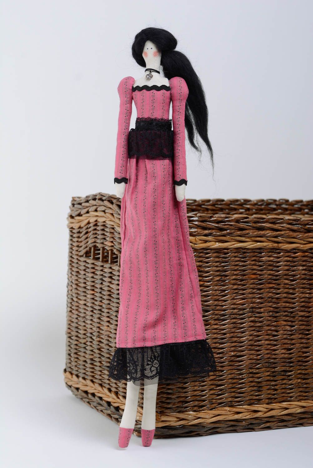 Designer doll made of cloth with black hair in pink dress handmade interior toy photo 1