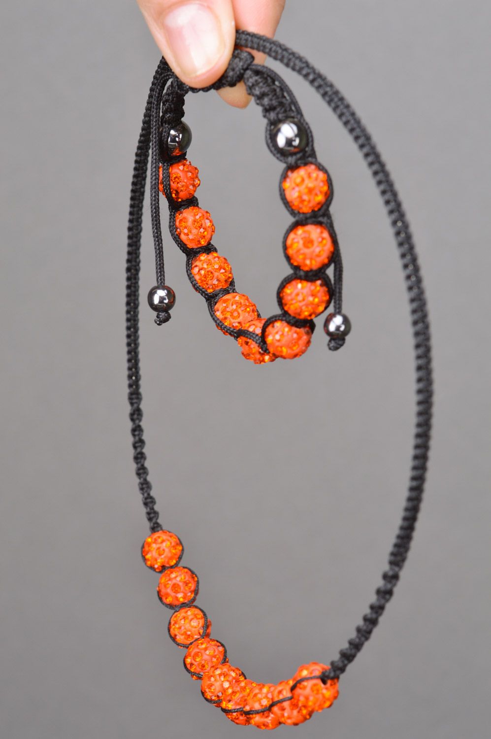 Set of jewelry woven of threads and orange beads necklace and friendship bracelet photo 3