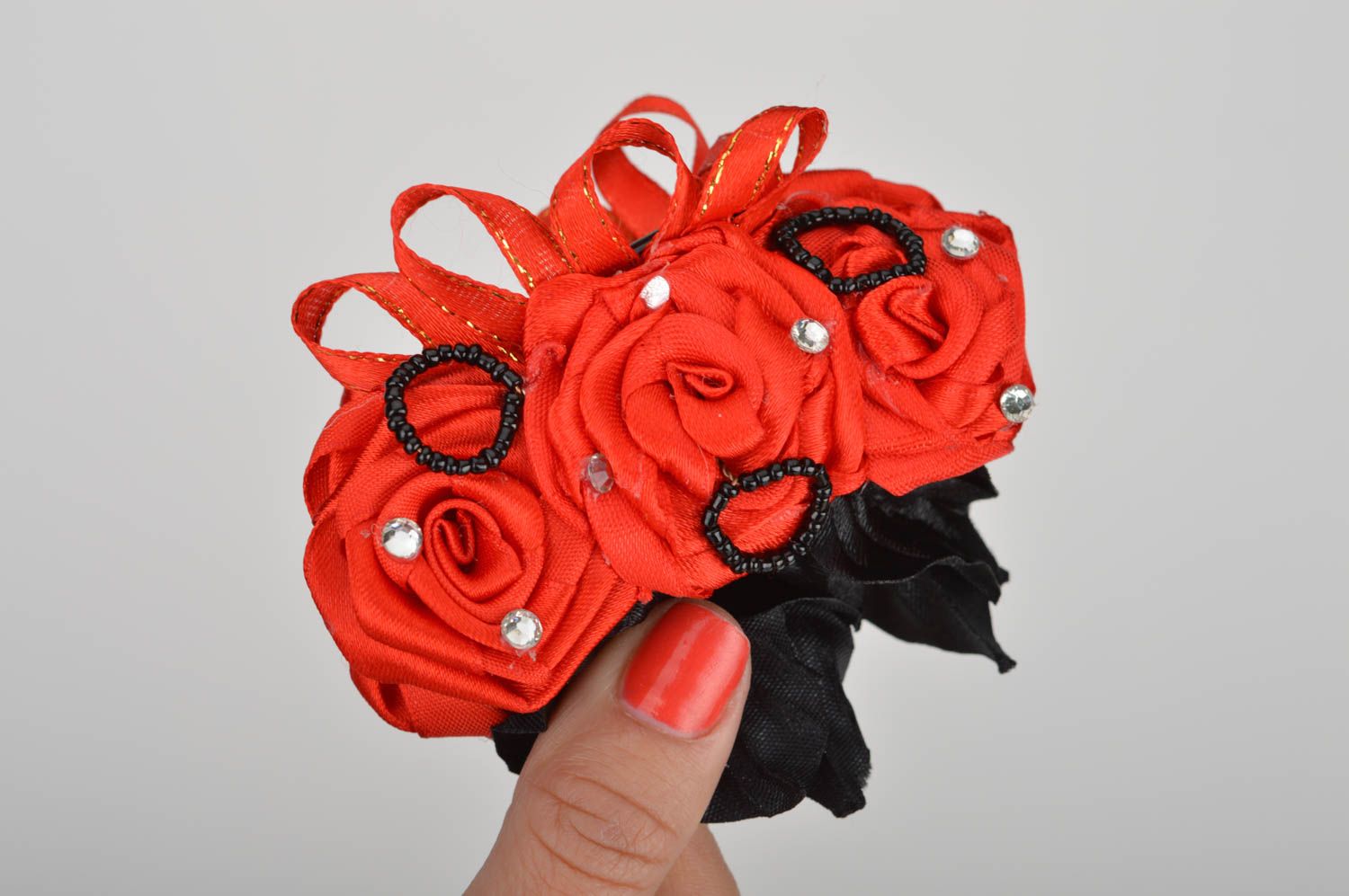 Red with black beautiful handmade hair pin made of fabric in shape of flowers photo 3