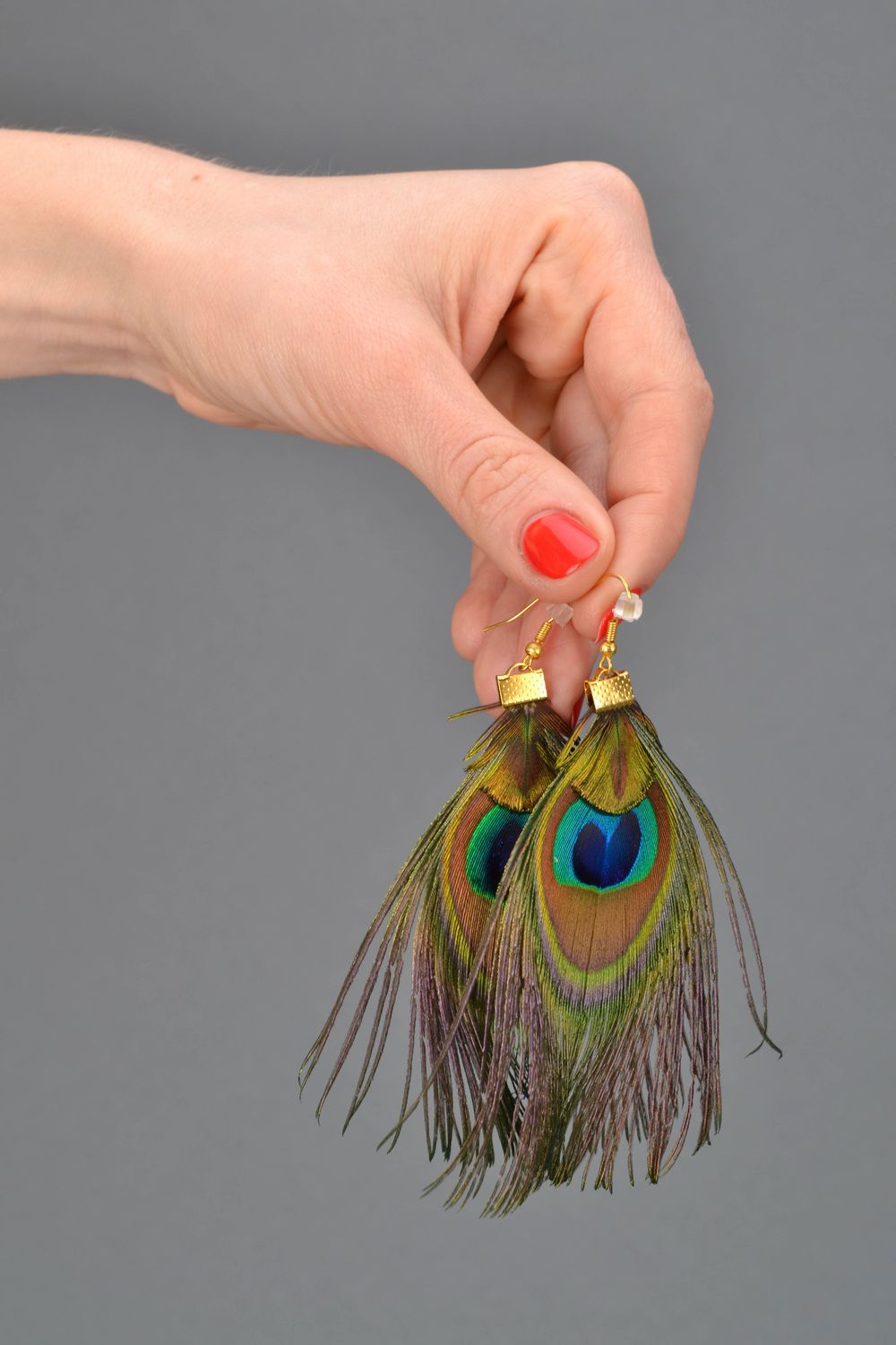 Pendientes hechos a mano de plumas de pavo real foto 2