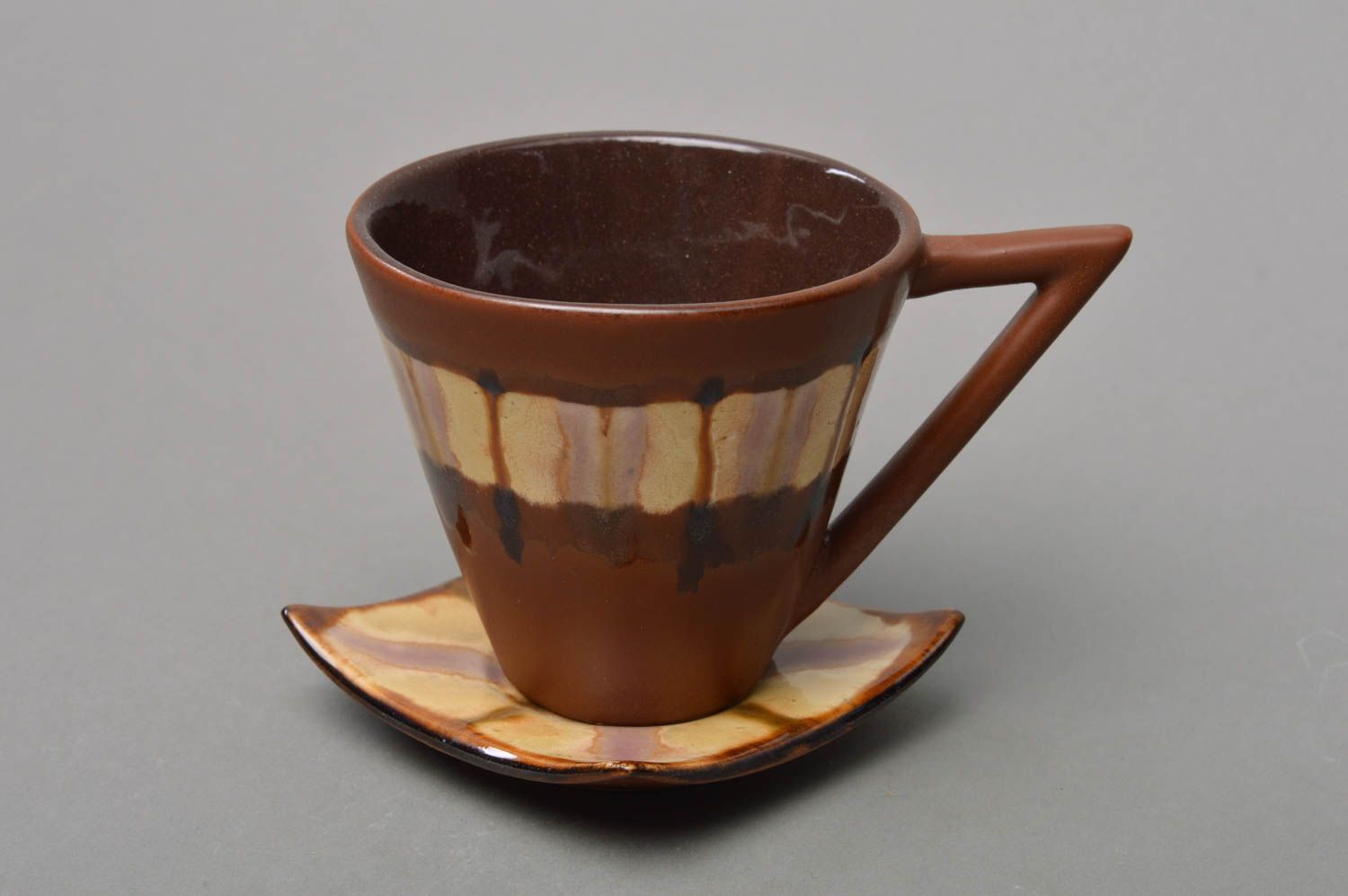 Elegant dark brown and light brown porcelain coffee cup with triangle handle and saucer photo 1