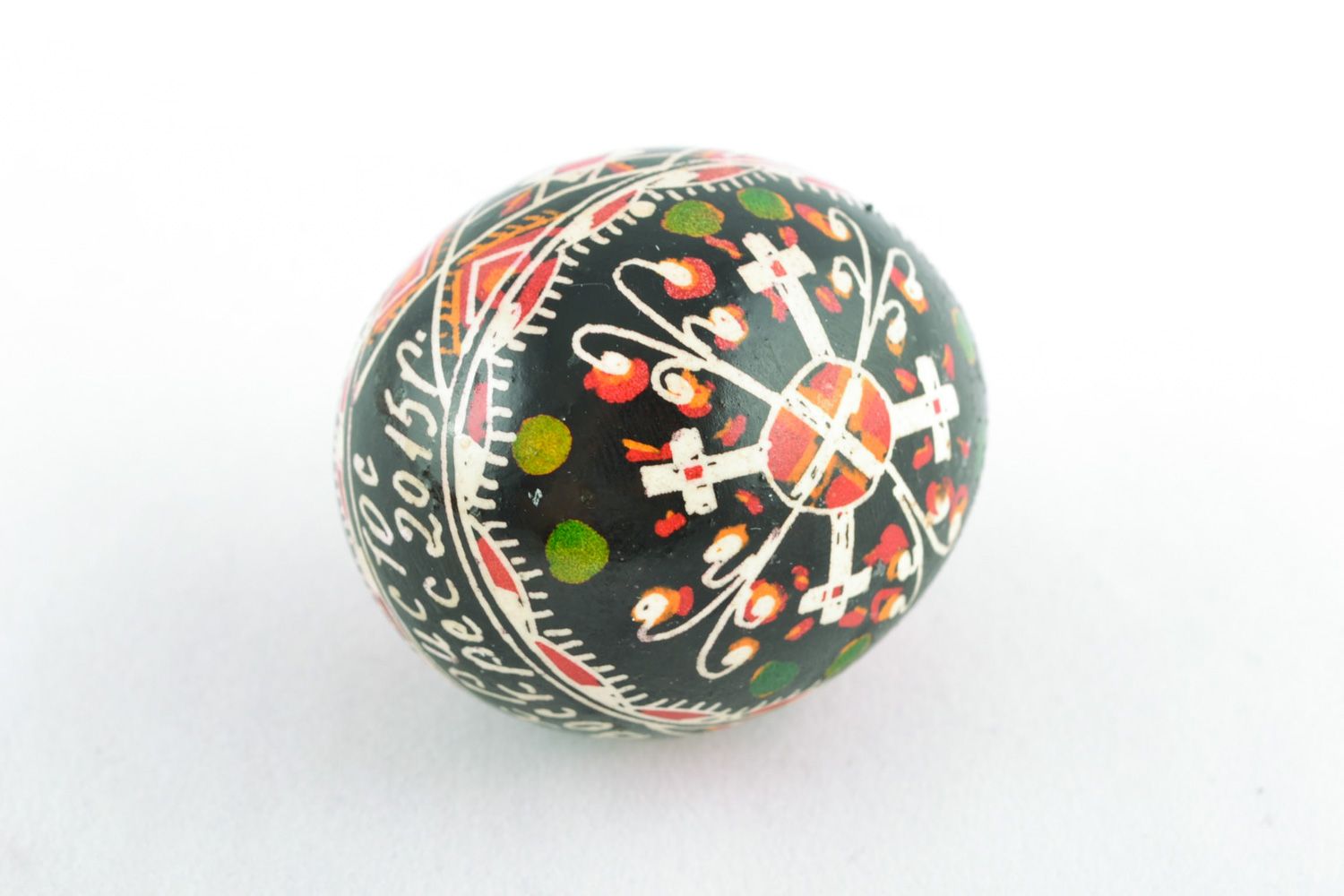 Handmade Easter egg with cross-shaped ornament painted with wax and aniline dyes photo 3