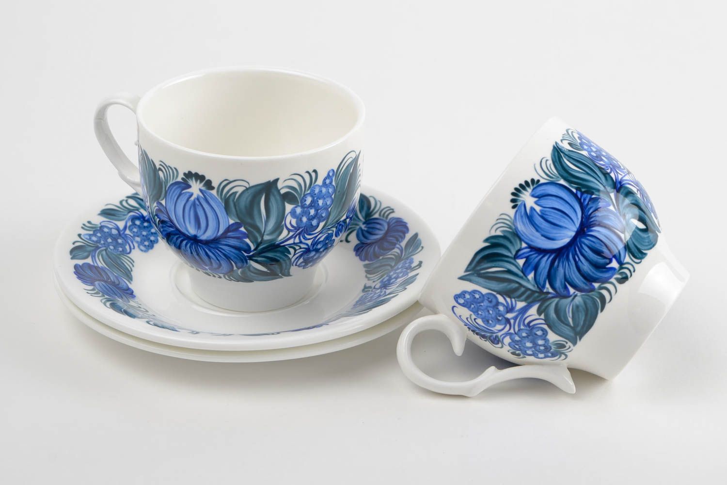 Set of two porcelain white and blue 5 oz tea cups and saucers with floral pattern photo 4