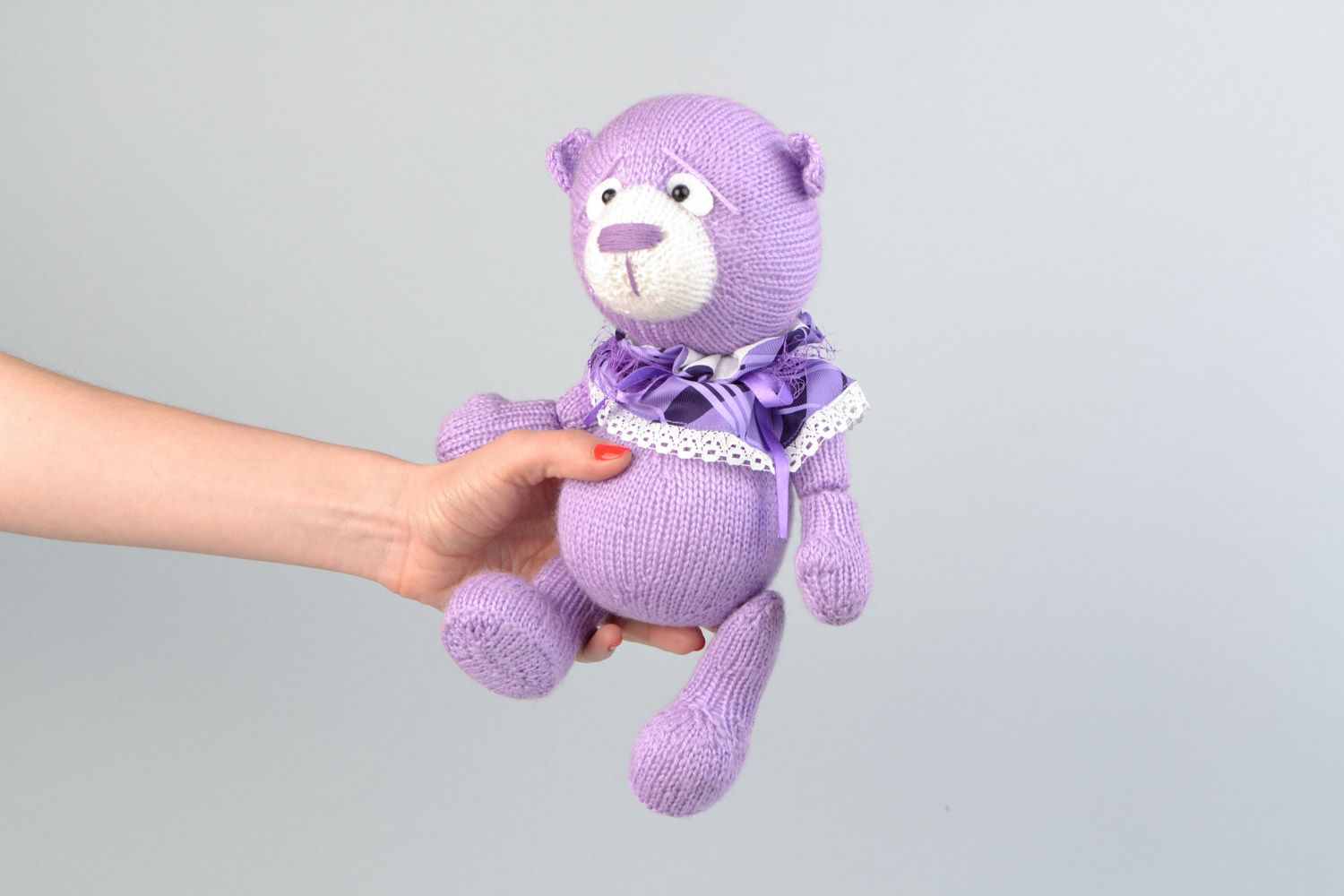 Handmade decorative crocheted purple bear toy with a bow for children photo 2