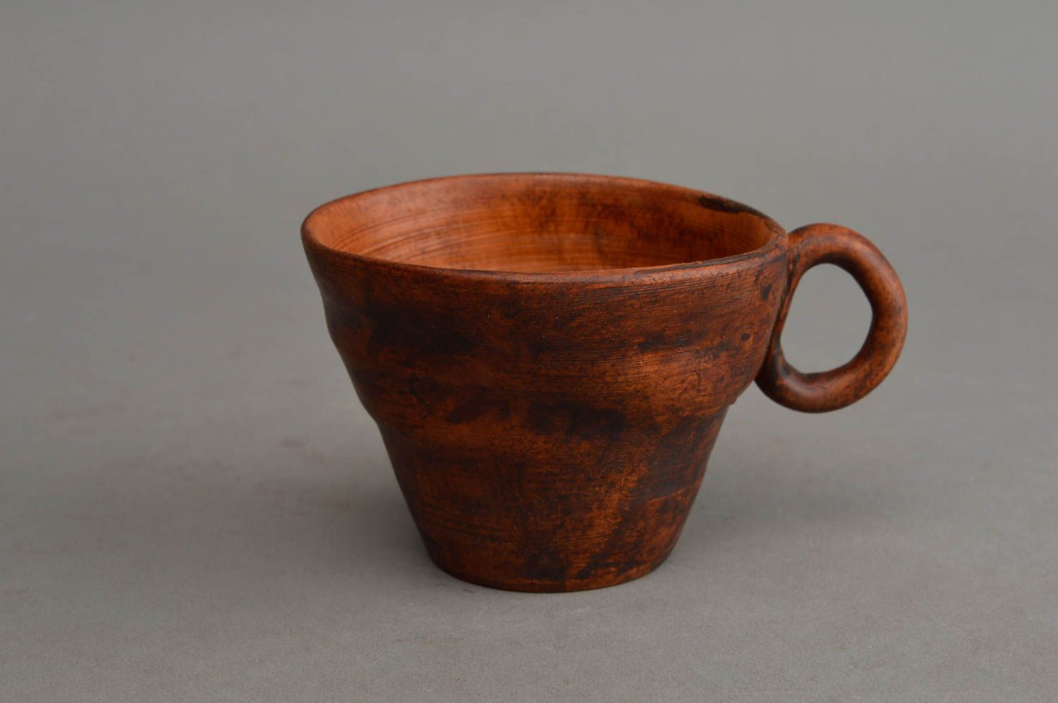 Clay drinking cup in a triangle shape with handle in brown natural color photo 2