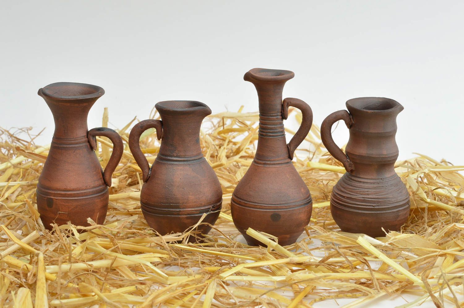Set of 4 decorative small ceramic pitchers for home décor 0,8 lb photo 1