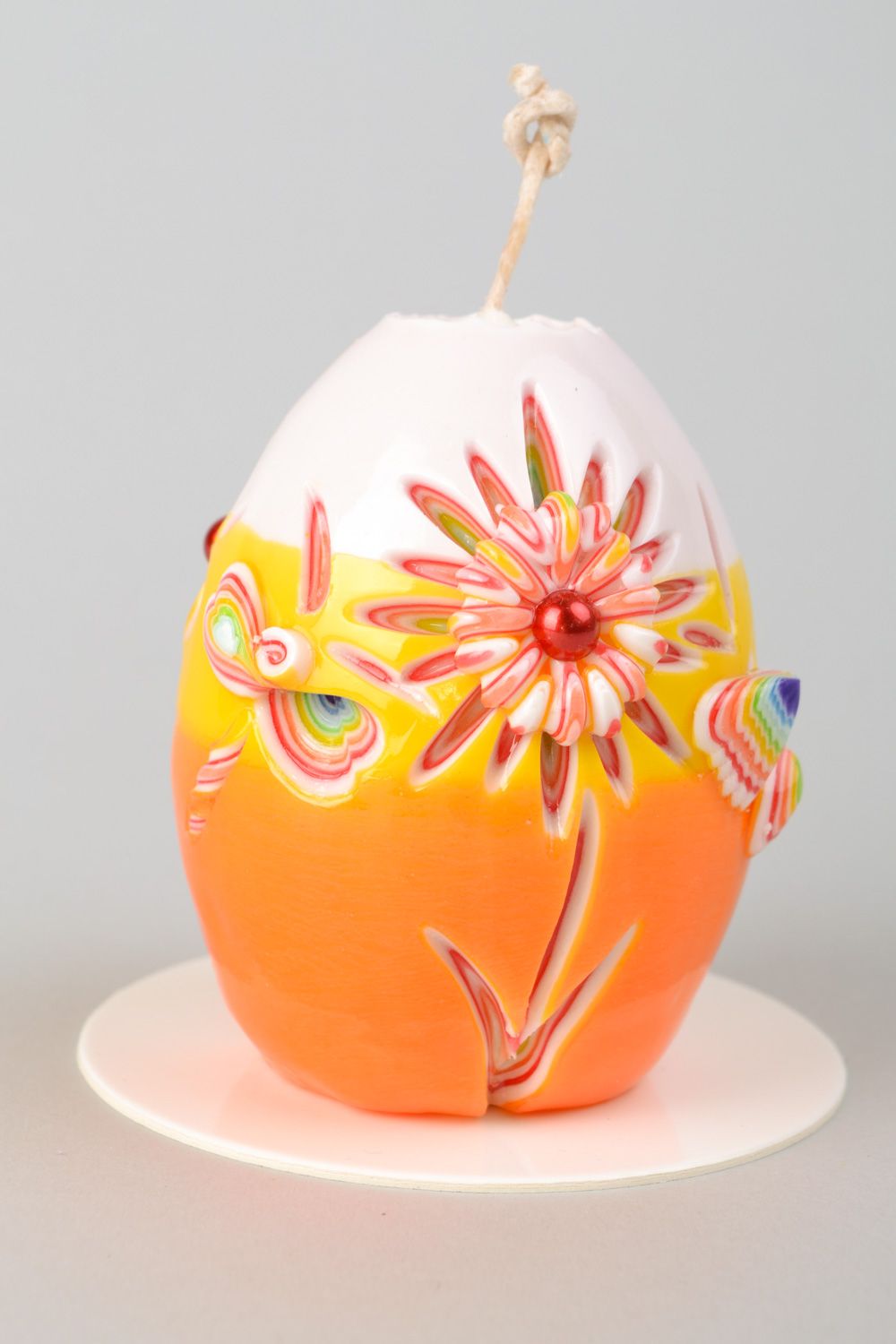 Парафиновая свеча в форме яйца пасхальный подарок фото 1