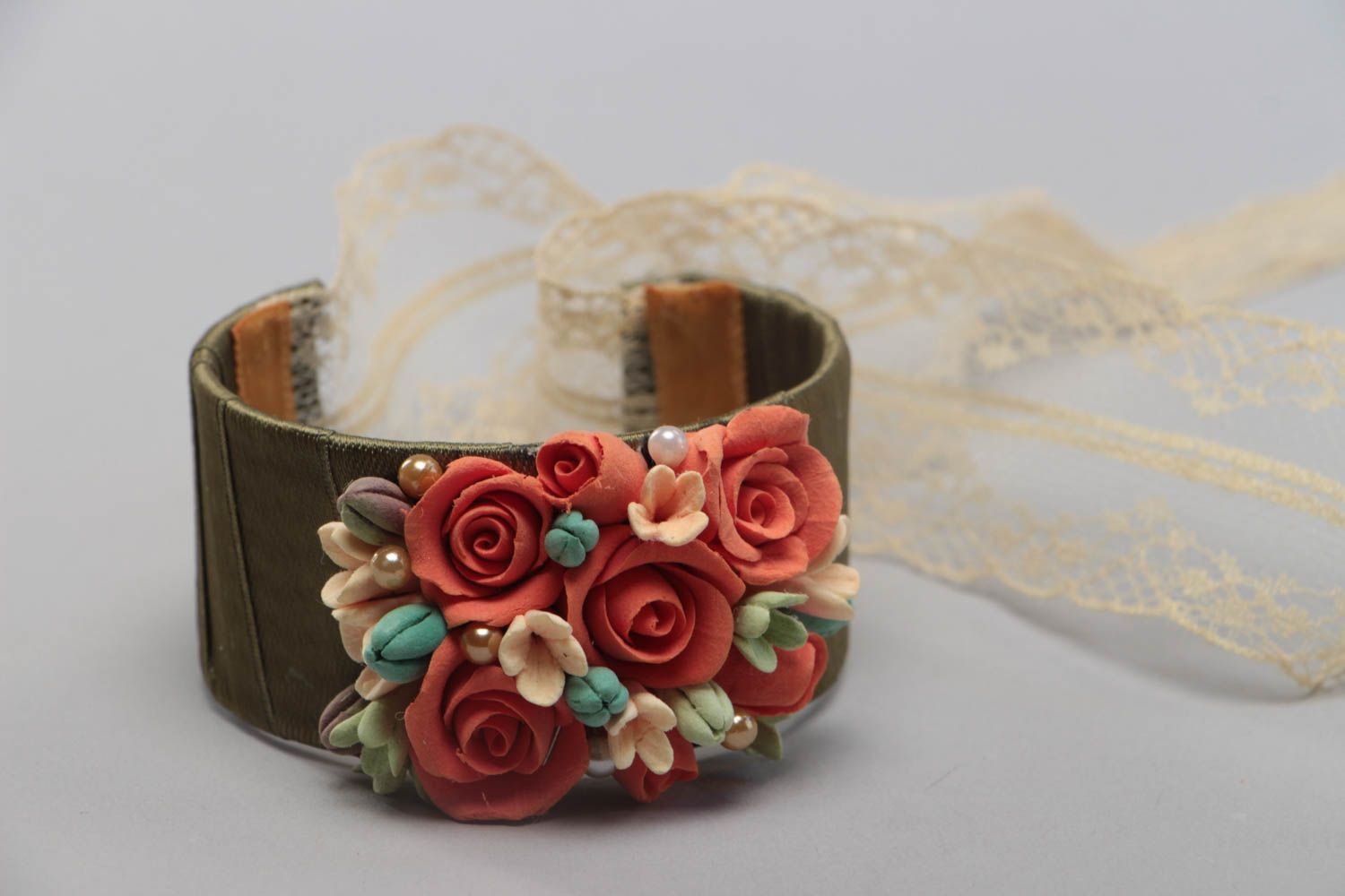Unusual beautiful handmade wrist bracelet with plastic flowers and lace ribbon photo 1